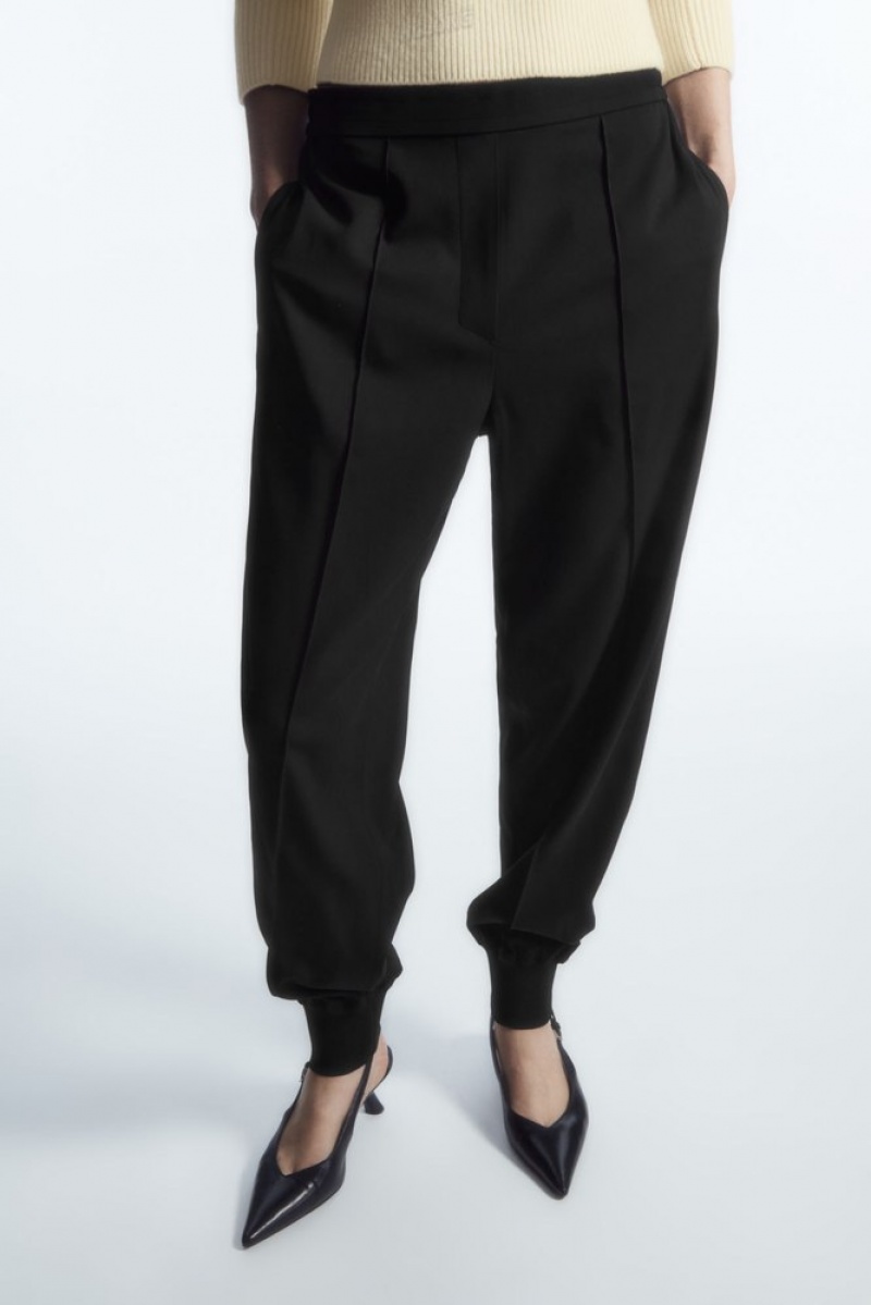 Black COS Pintucked Elasticated Tailored Joggers | YM73-X3VZ