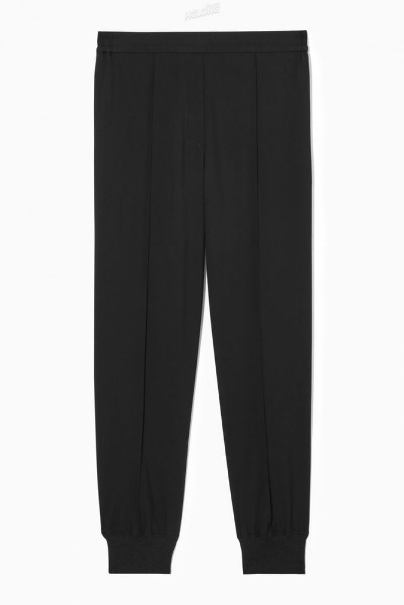 Black COS Pintucked Elasticated Tailored Joggers | YM73-X3VZ